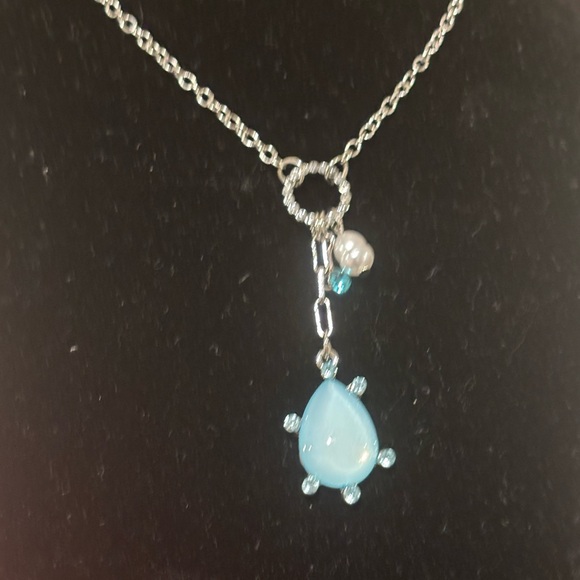 Emberly Elegant Silver Tone Necklace with Teardrop Blue Pendant - Picture 3 of 8